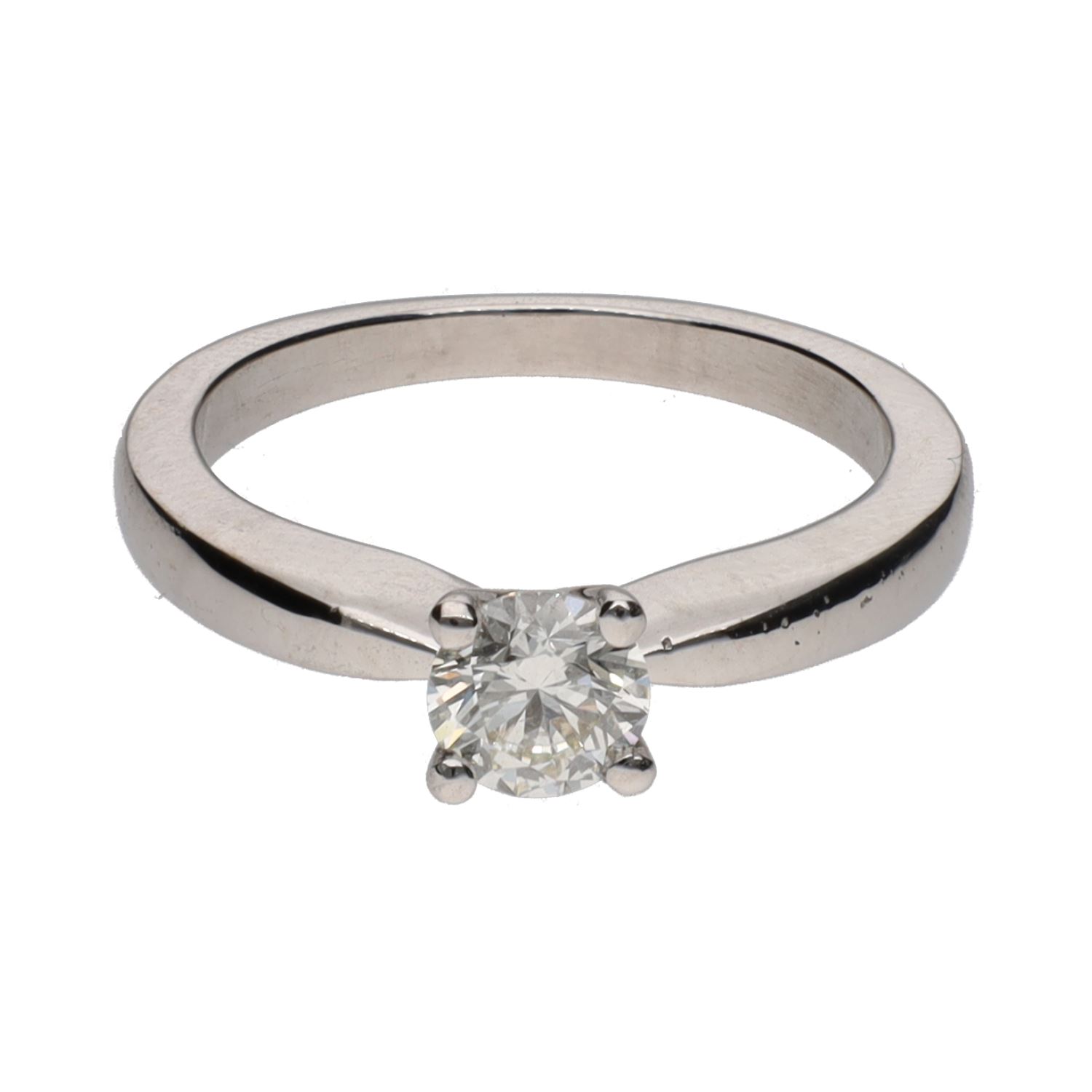 Sortija solitario en oro blanco con brillante. Talla 12.