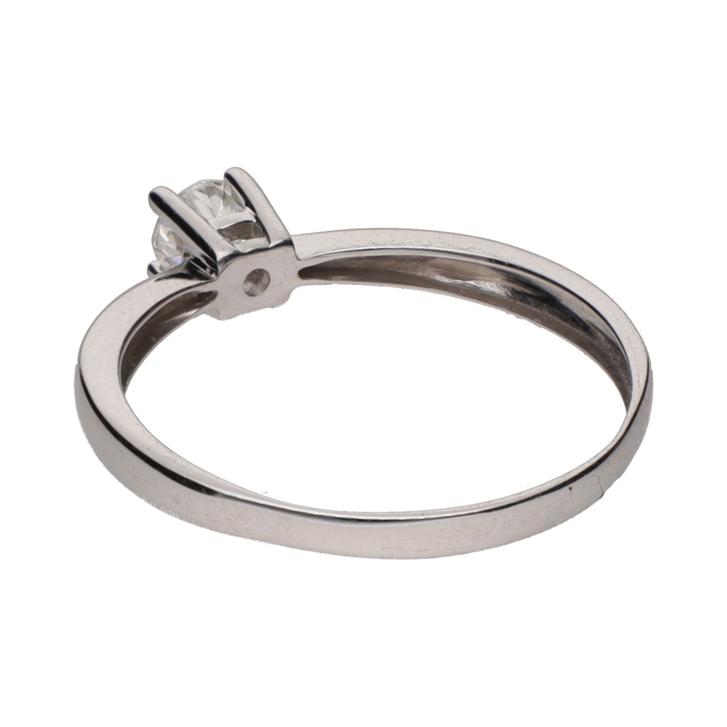 Solitario en oro blanco con un brillante 0,20ct . Talla 12.