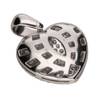 Colgante con forma de corazón en oro blanco y cuajado de brillantes.