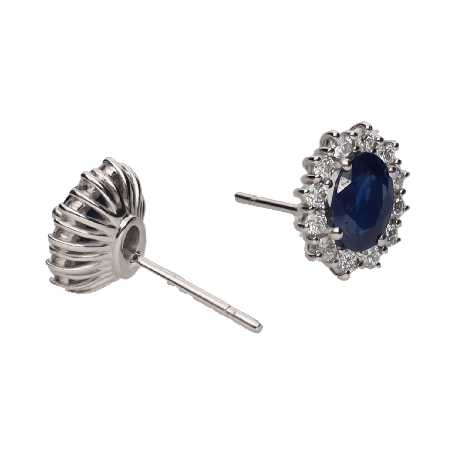 Pendientes en oro blanco con zafiros y orla de brillantes.