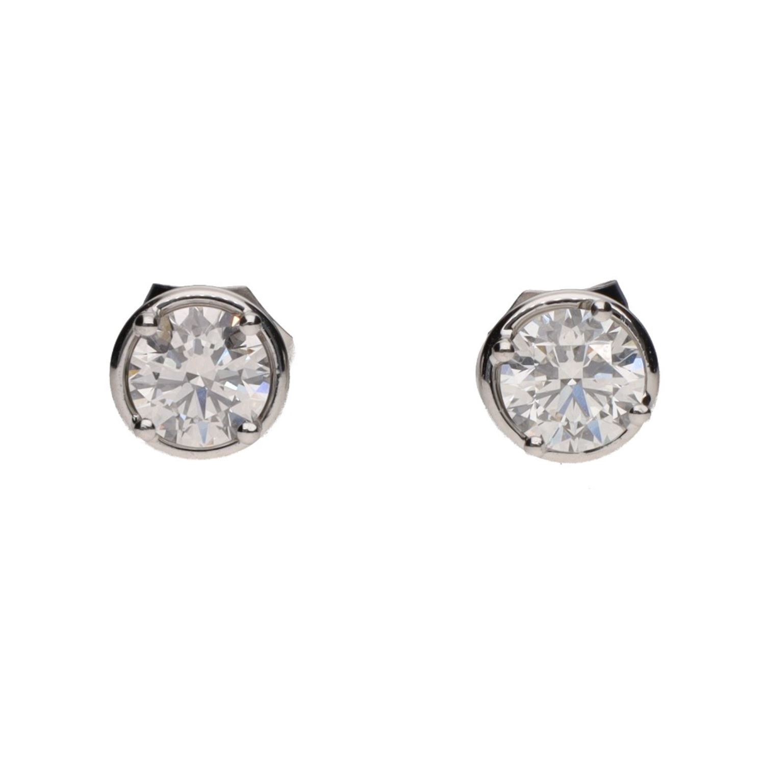 Pendientes dormilonas en oro blanco con brillantes.