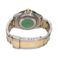 Submariner date acero y oro esfera negra 40mm.   