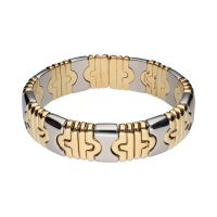 Pulsera abierta parentesis de bulgari en acero y oro.