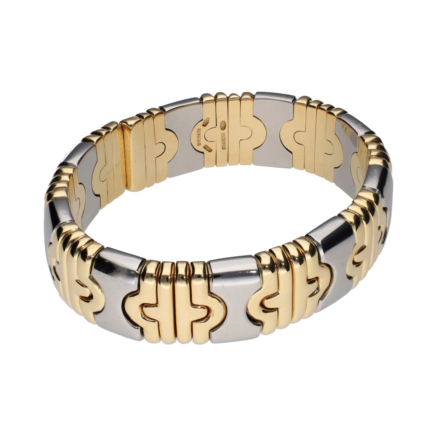 Pulsera abierta parentesis de bulgari en acero y oro.