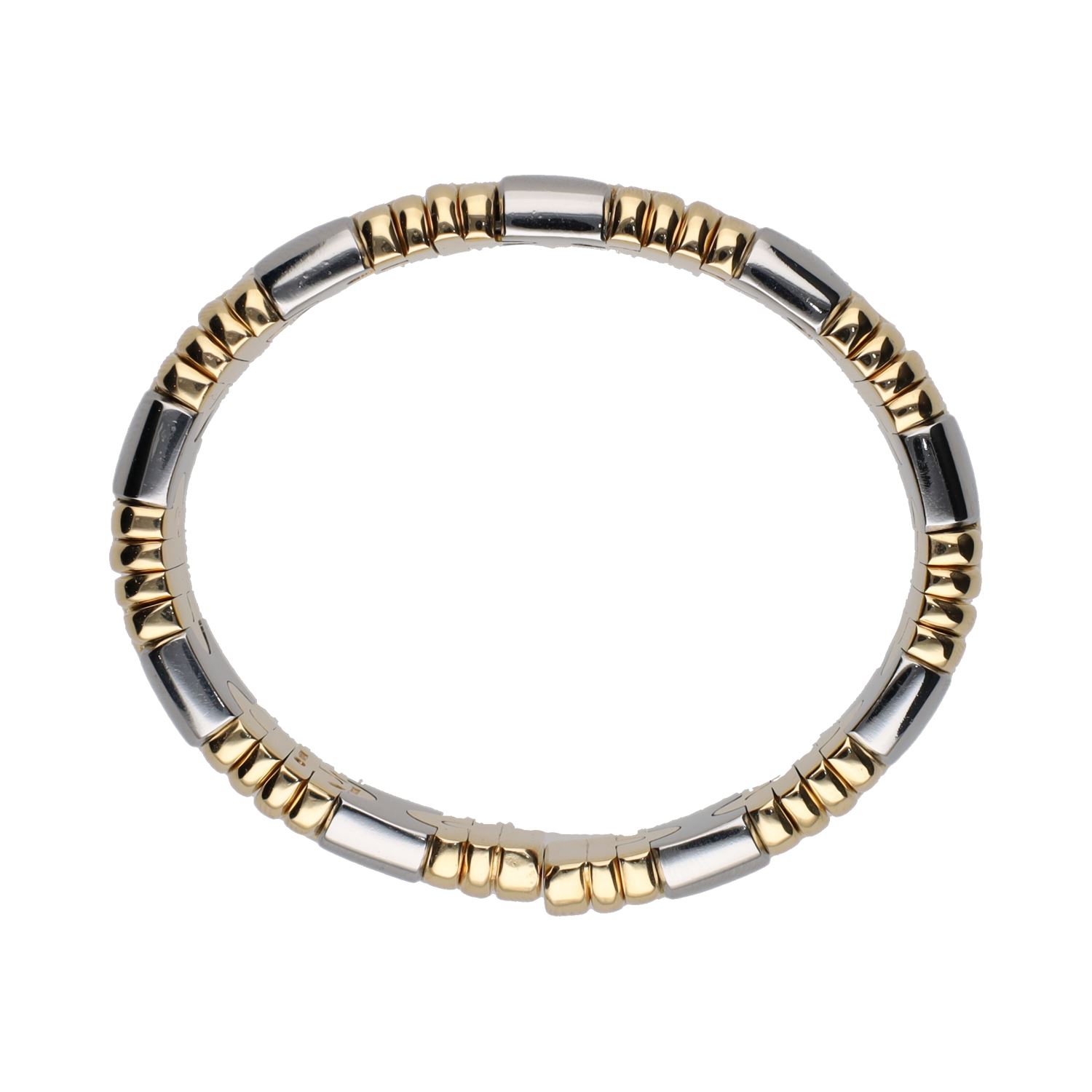 Pulsera abierta parentesis de bulgari en acero y oro.