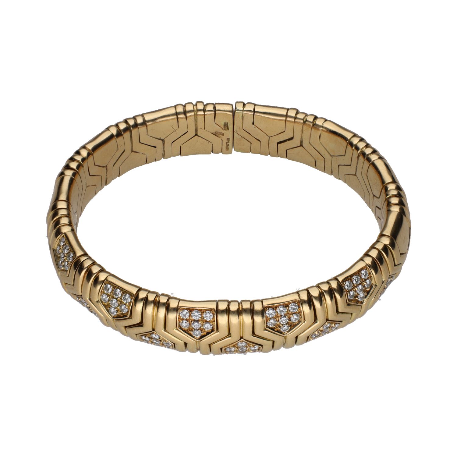 Pulsera abierta bulgari serpenti en oro amarillo con brillantes.