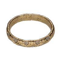 Pulsera abierta bulgari serpenti en oro amarillo con brillantes.