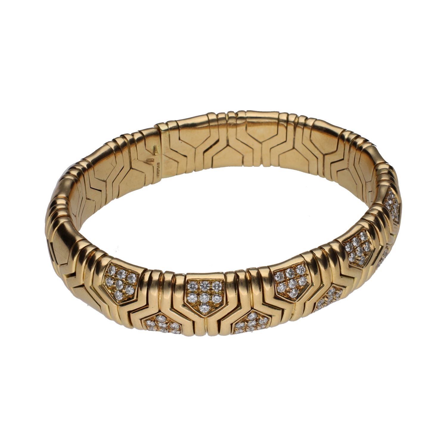 Pulsera abierta bulgari serpenti en oro amarillo con brillantes.