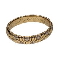 Pulsera abierta bulgari serpenti en oro amarillo con brillantes.