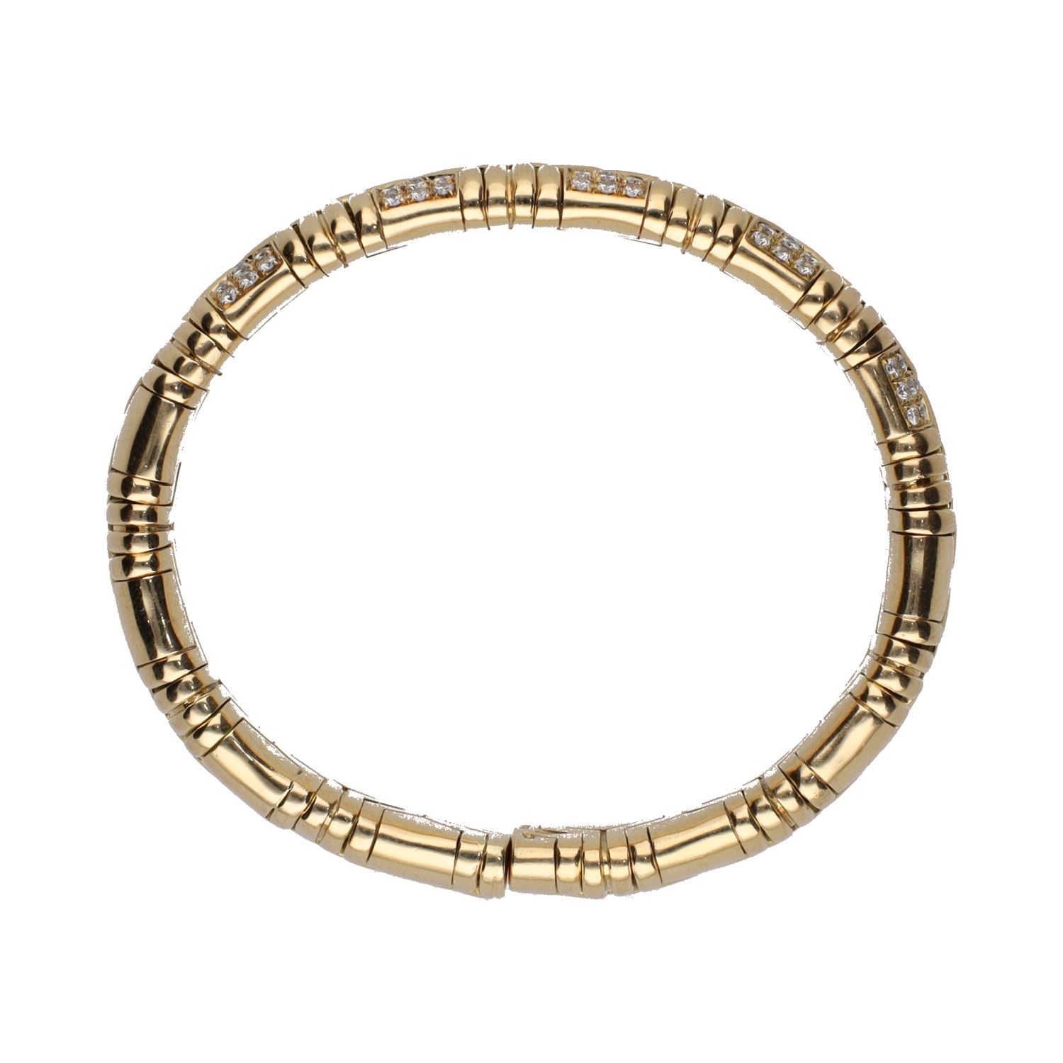 Pulsera abierta bulgari serpenti en oro amarillo con brillantes.