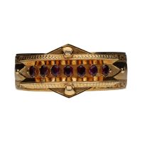 Pulsera antigua ancha en oro amarillo y amatistas.