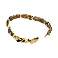 Pulsera en oro amarillo con cuarzos amatistas.