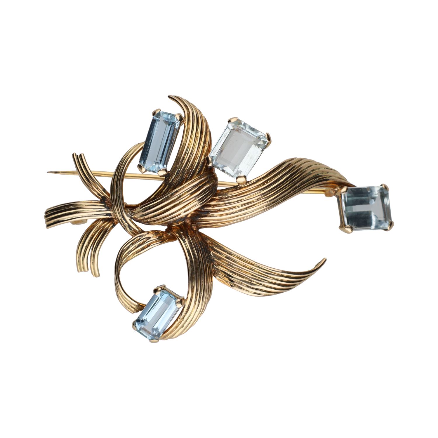 Broche en oro amarillo con agua marinas.