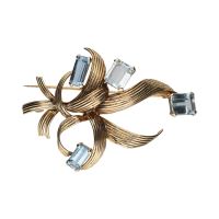 Broche en oro amarillo con agua marinas.