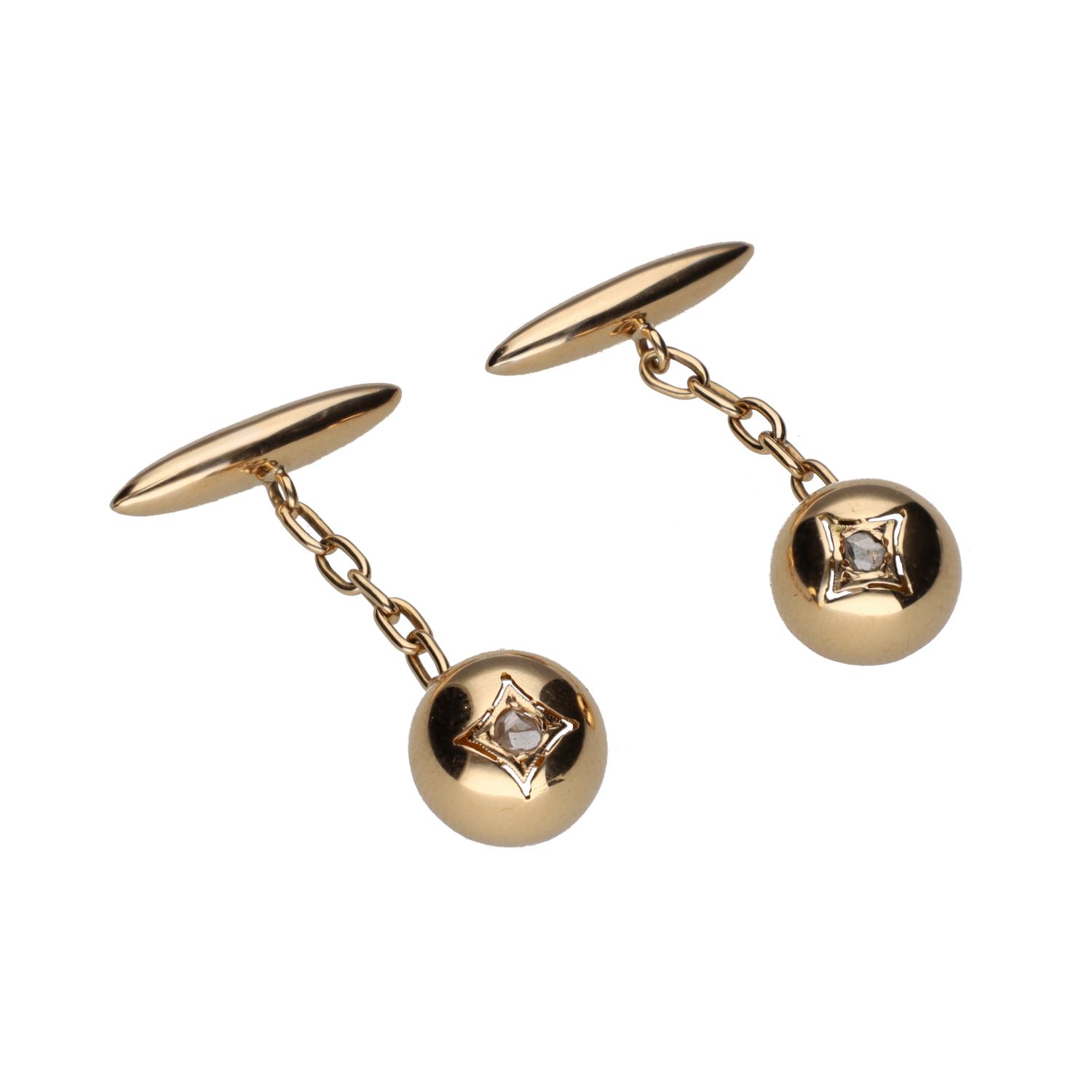 Gemelos en oro amarillo con diamantes.