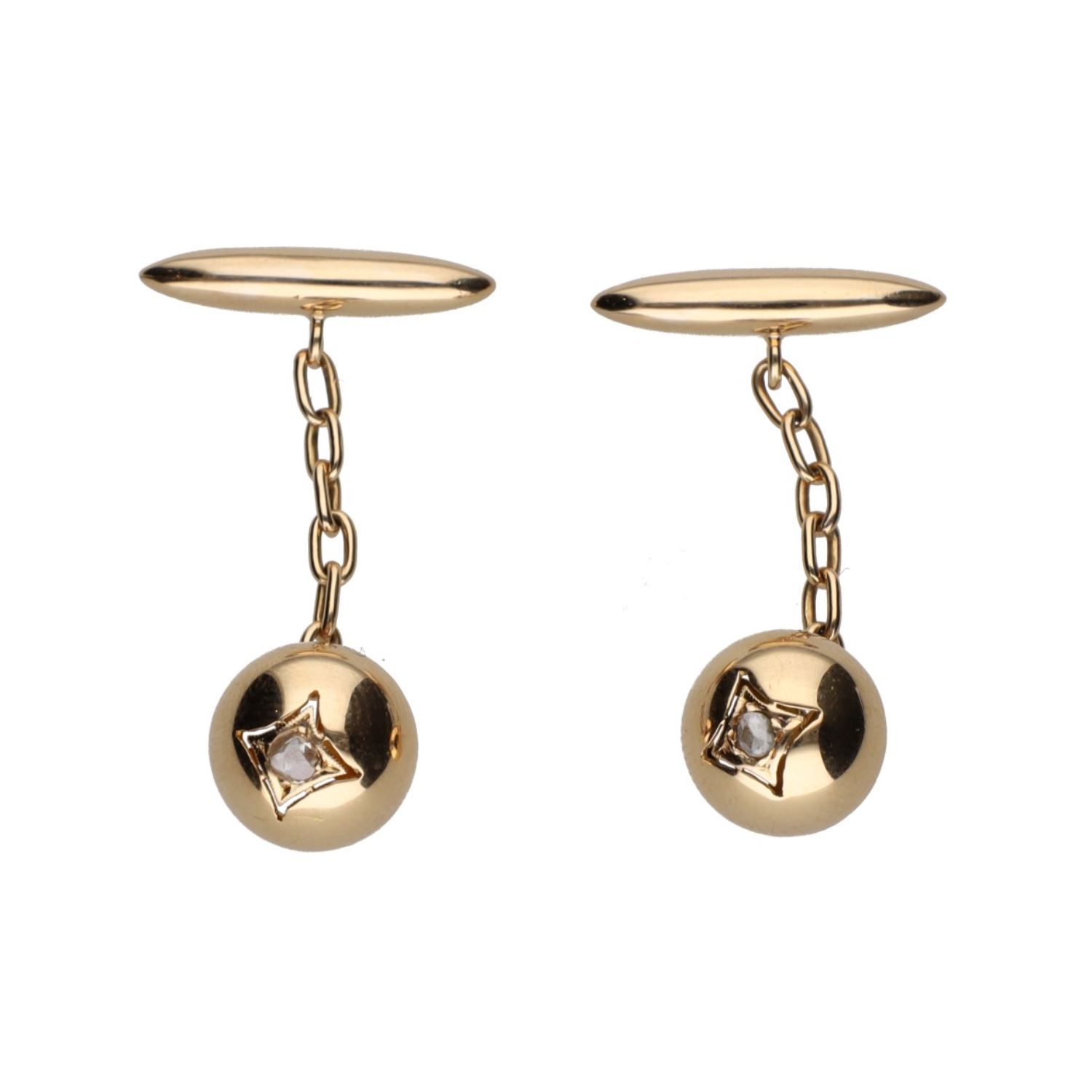 Gemelos en oro amarillo con diamantes.