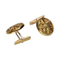 Gemelos en oro amarillo con forma de medallón.