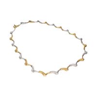 Collar semirrígido en oro amarillo y oro blanco.
