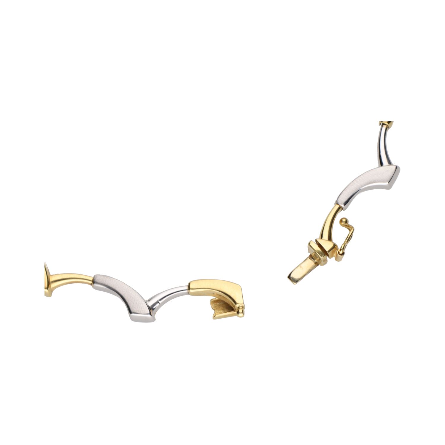 Collar semirrígido en oro amarillo y oro blanco.