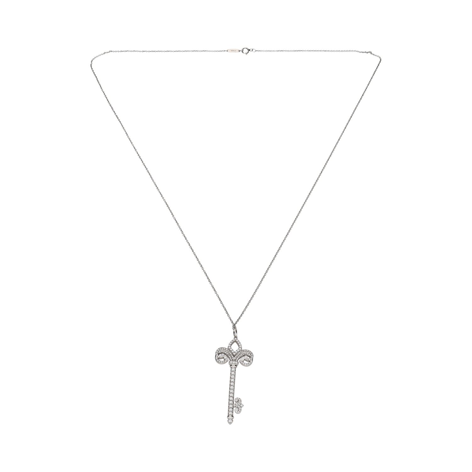 Collar y colgante llave de tiffany & co en platino y brillantes.