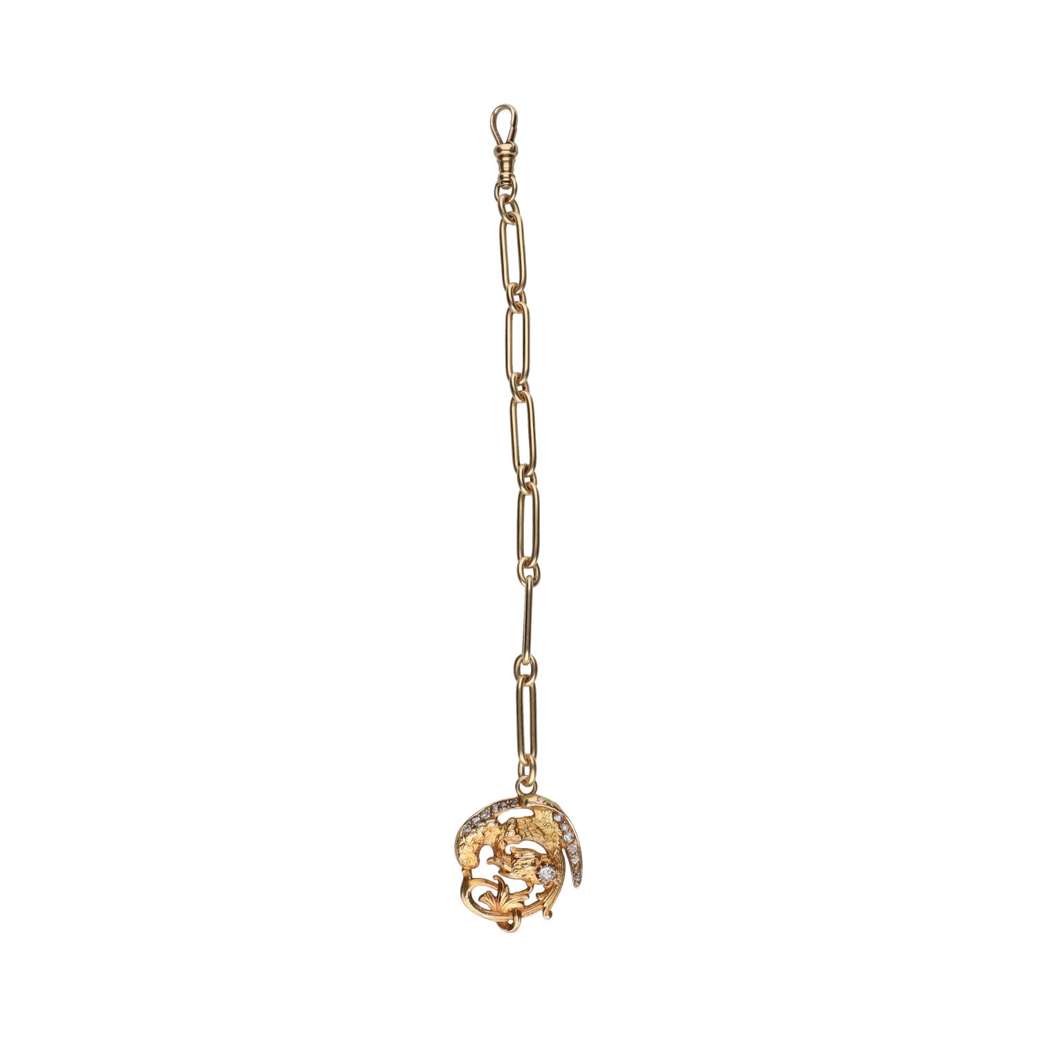 Leontina en oro amarillo en forma de fénix con diamantes.