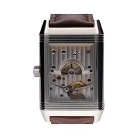 Reverso grande date reserva de marcha acero cuerda manual.  