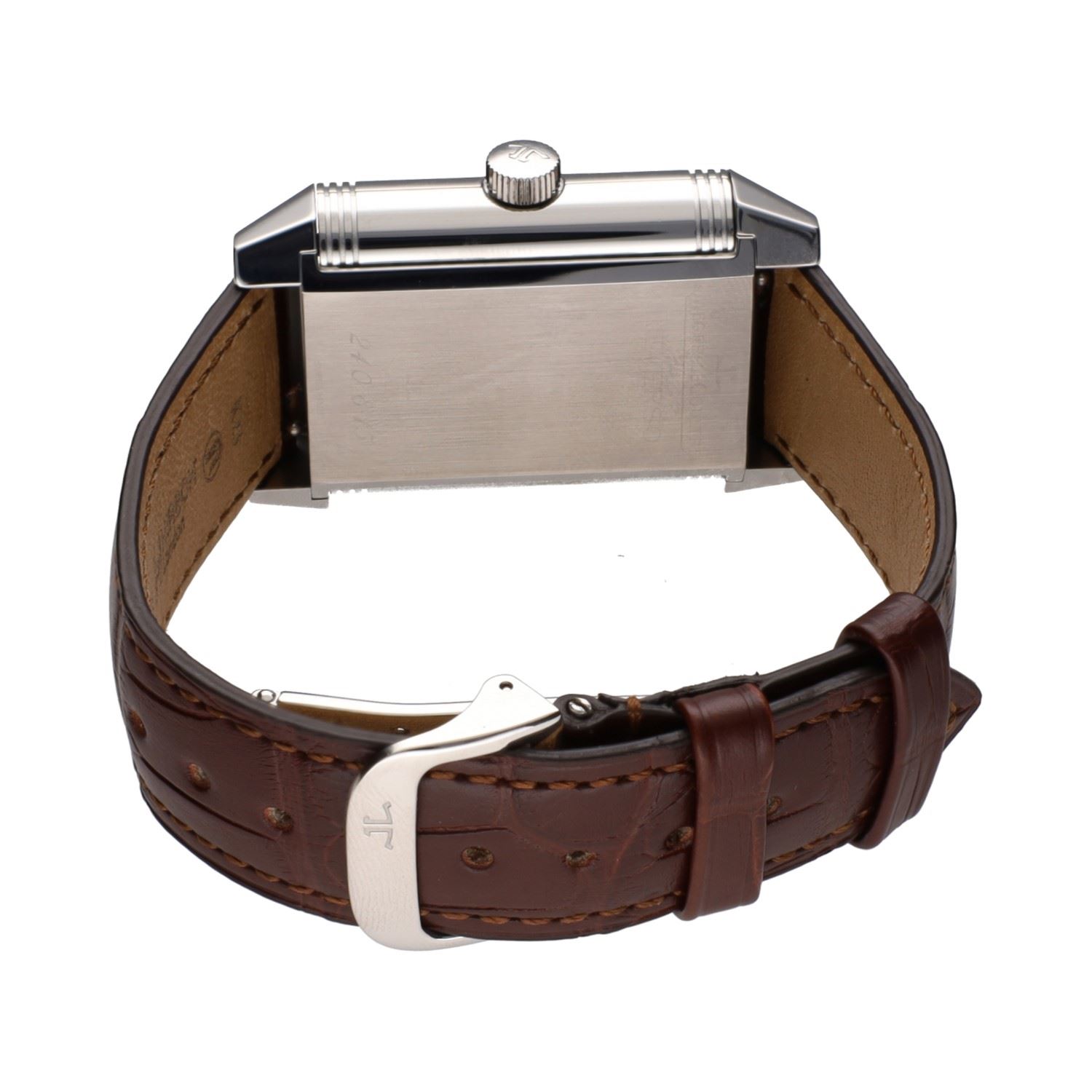 Reverso grande date reserva de marcha acero cuerda manual.  