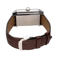 Reverso grande date reserva de marcha acero cuerda manual.  