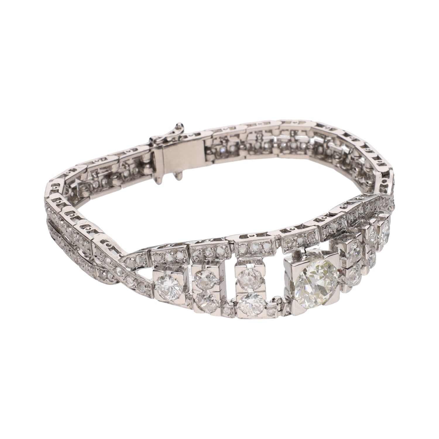Pulsera antigua en oro blanco con diamantes.