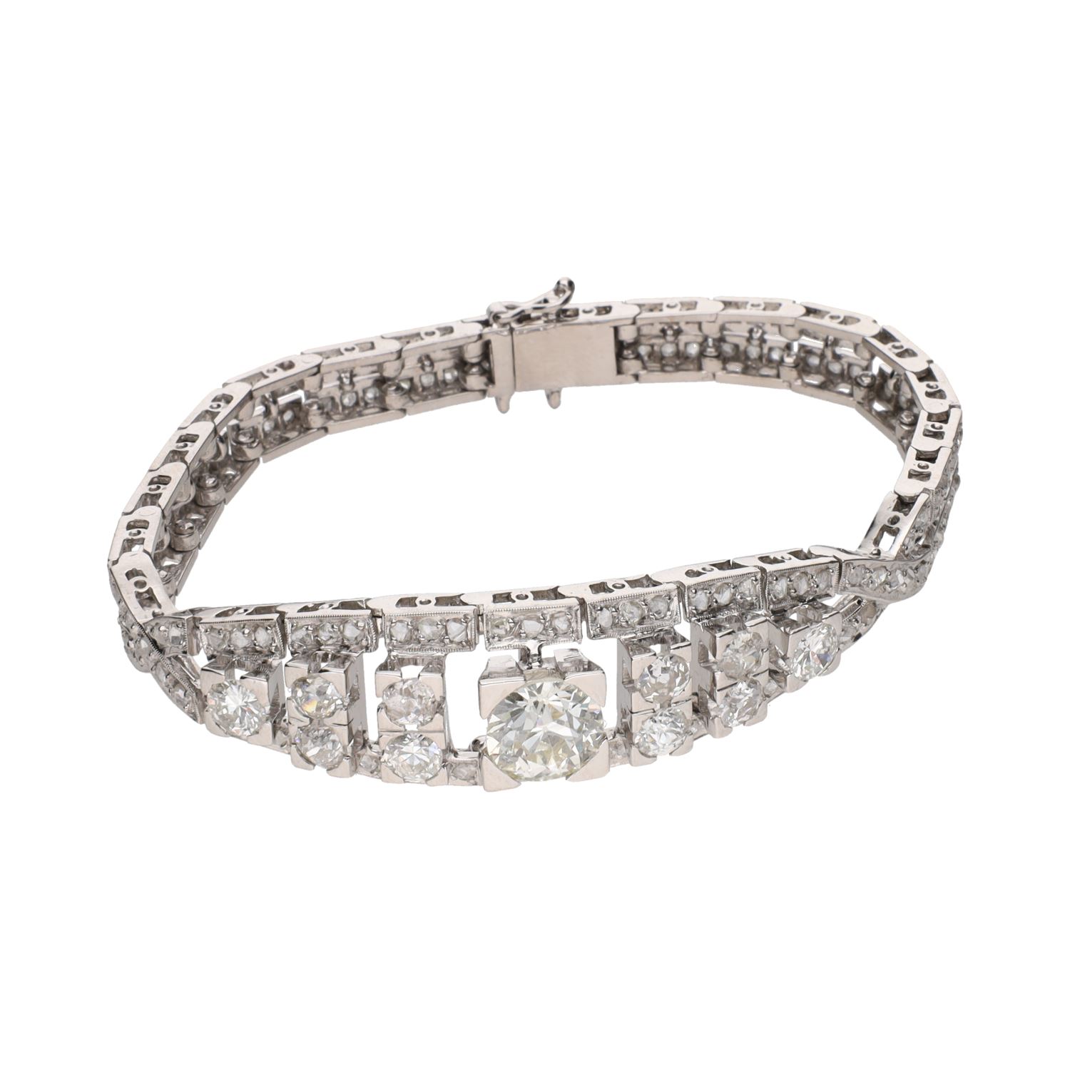 Pulsera antigua en oro blanco con diamantes.