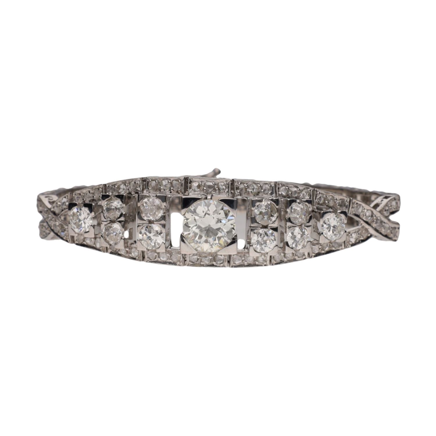 Pulsera antigua en oro blanco con diamantes.