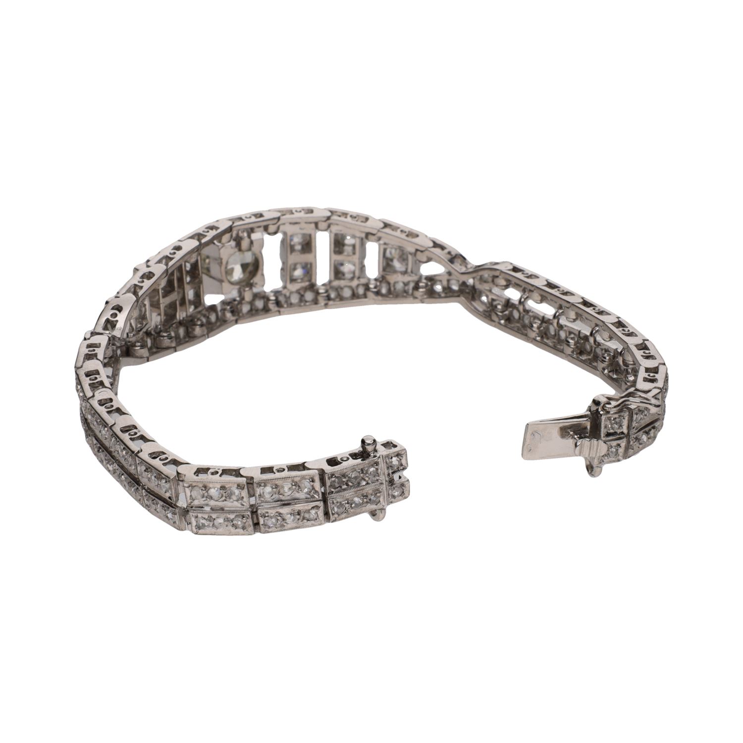 Pulsera antigua en oro blanco con diamantes.