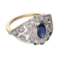 Sortija en oro amarillo y oro blanco con zafiro y diamantes. Talla 15.